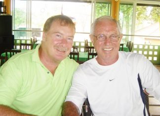 The previous week’s big winner, Tony Chetland, celebrates with Ken Hole, the winner at Greenwood this past week.